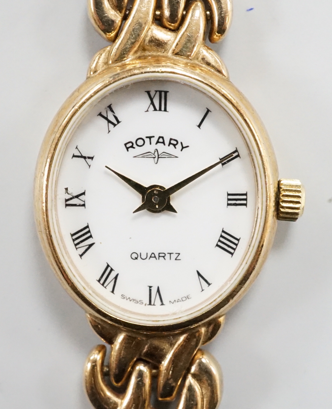 A lady's modern 9ct gold Rotary quartz wrist watch, on a 9ct gold Rotary bracelet, overall 17.5cm gross weight 16.5 grams.